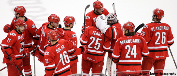 Checkers congratulate Murphy on a 3-2 win Saturday